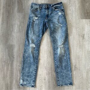American Eagle Distressed Next Level Flex Slim Jeans